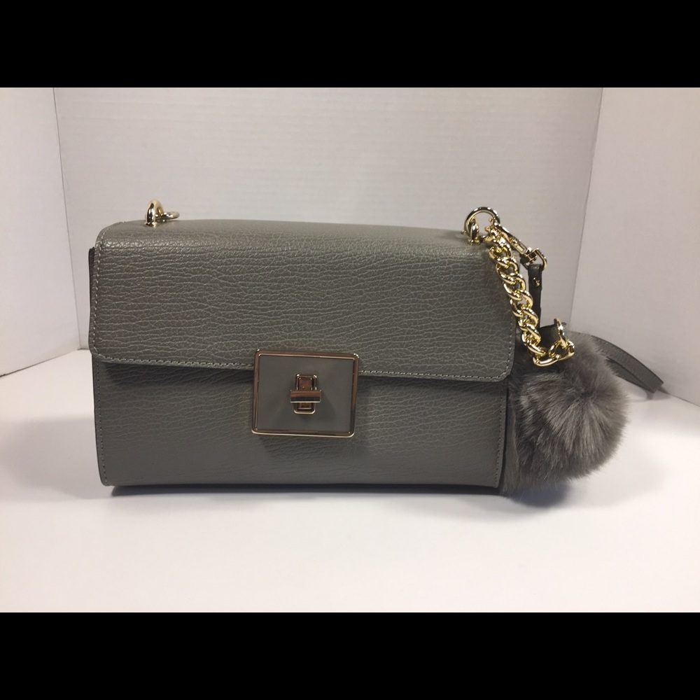 Cross Body Handbag with puffball.